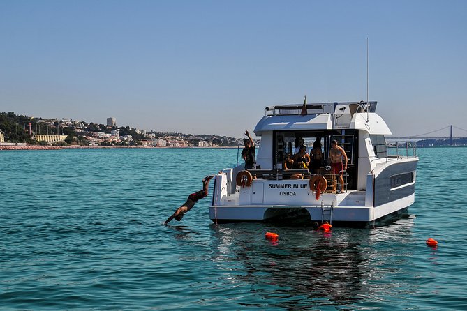 1H power catamaran up to 18 people in Lisbon - The Discoveries Monument and Portugal’s riverfront story