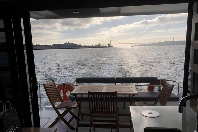 1H power catamaran up to 18 people in Lisbon - Belém Tower from the river