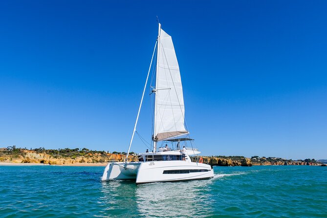 2h30 Private Sunset Catamaran Adventure in Albufeira - Arco do Triunfo and the Algarve’s rock coast