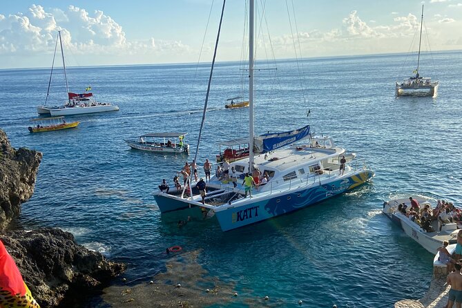 4 Hours Party Boat Catamaran Cruise in Negril - The snorkeling stop and swimming near a cave