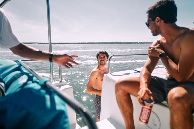 4 Hours Private Tour with Dives in Catamaran in Lisbon - Weather, timing, and cancellation