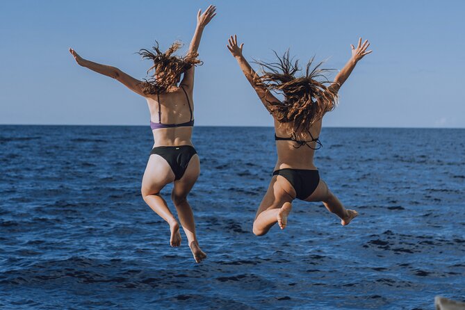 4-in-1 • Gili Islands Snorkel & Sunset Half-day Catamaran Cruise - Buffet dinner as the sun goes down