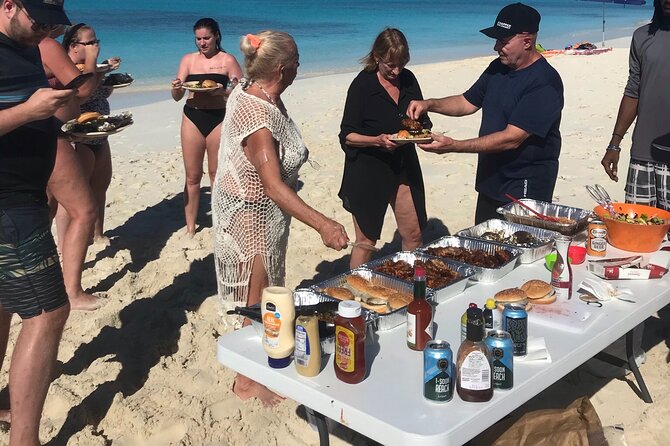 7 Hour Private Catamaran Sail, Snorkel and Beach BBQ Grace Bay, Providenciales - A beach barbecue with local flavor