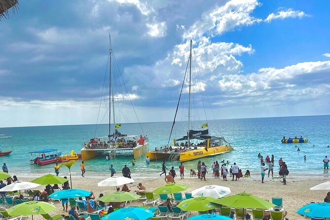 7 Mile Beach Party Catamaran Cruise with Snorkeling & Ricks Cafe - From Montego Bay to Negril’s famous shore