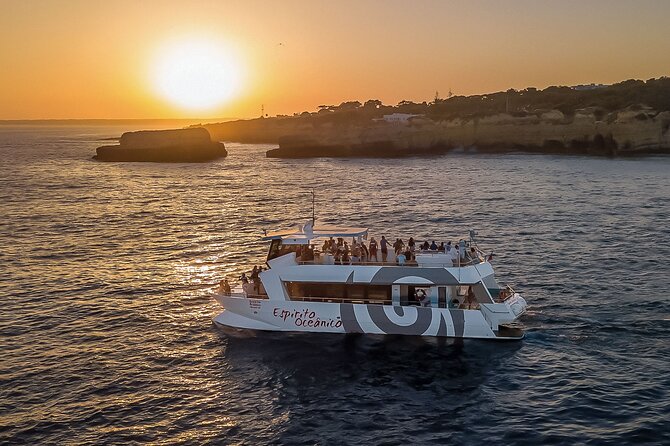 Albufeira: 6-Hour Sunset Dinner Catamaran Cruise with Open Bar - Timing, age rules, and booking details