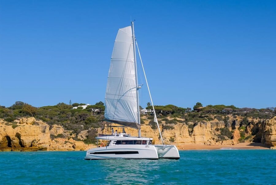Albufeira: Algarve Half-Day Private Catamaran Charter - Cruising toward Benagil’s famous caves