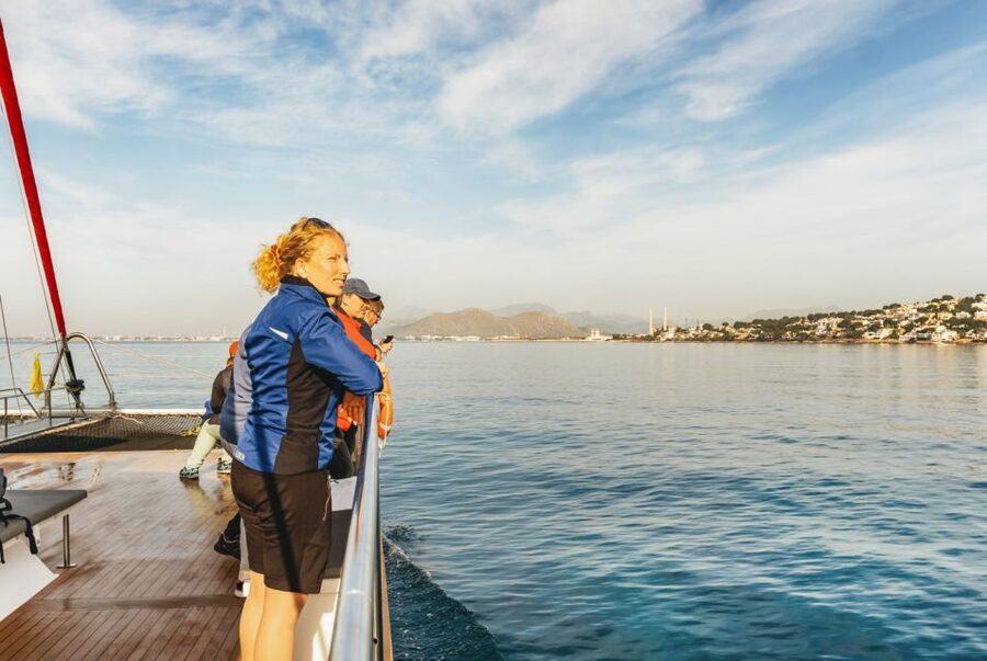 Alcudia: Sunset Catamaran Tour with Dinner and Snorkeling - Dinner on board: what the $77 price covers