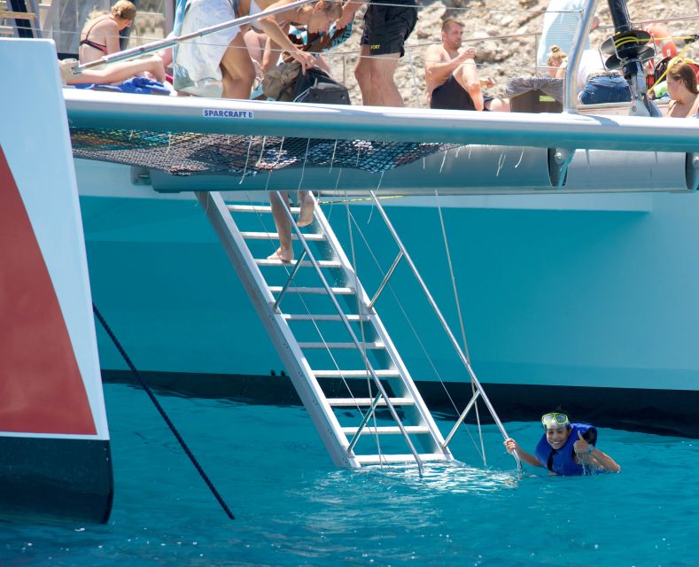 Alcudia: Sunset Catamaran Tour with Dinner and Snorkeling - Music, crew, and the social side of the trip