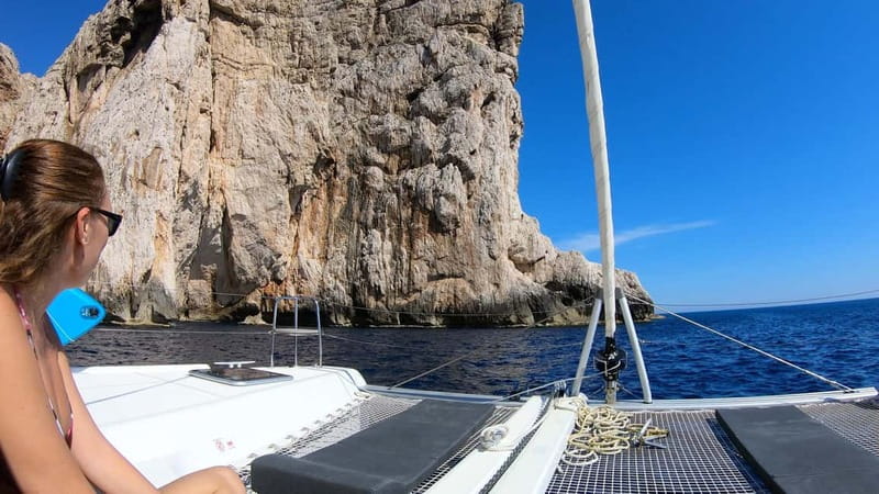 Alghero: Scenic Catamaran Cruise with Lunch and Snorkeling - Sailing through Porto Conte and Capocaccia Park