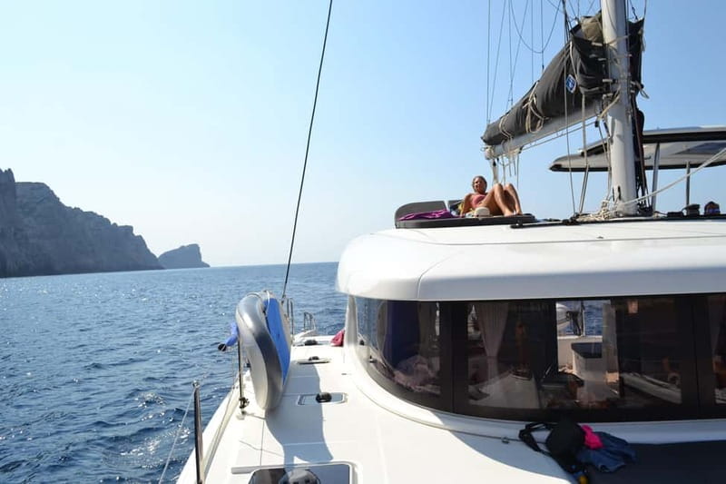 Alghero: Scenic Catamaran Cruise with Lunch and Snorkeling - Swimming and snorkeling in clear water