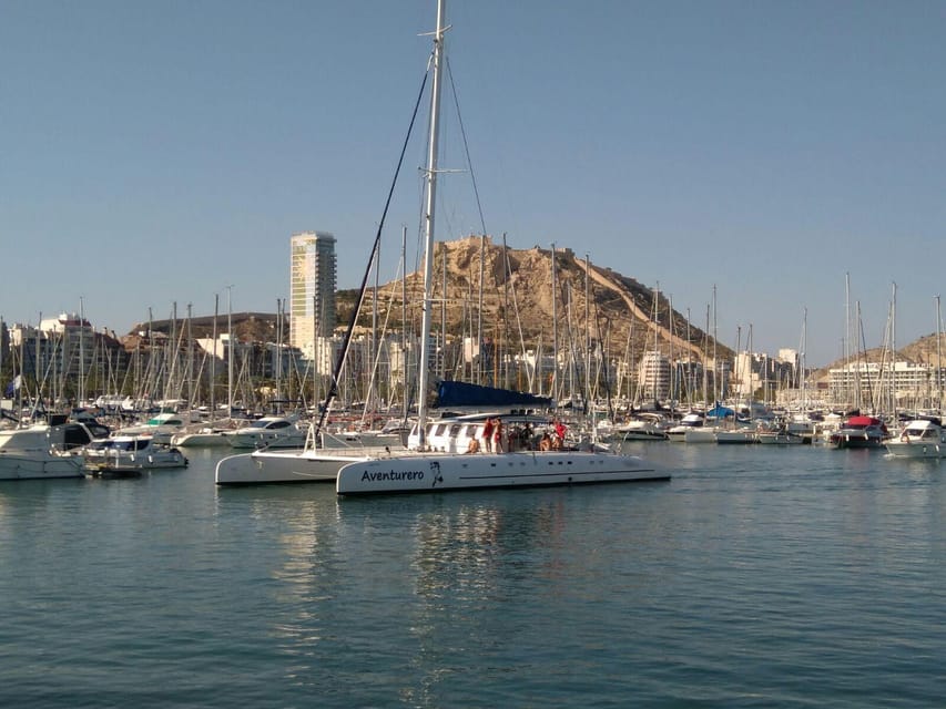 Alicante: 2-Hour Late Afternoon Catamaran Cruise - Fruit, drinks, music, and the onboard bar