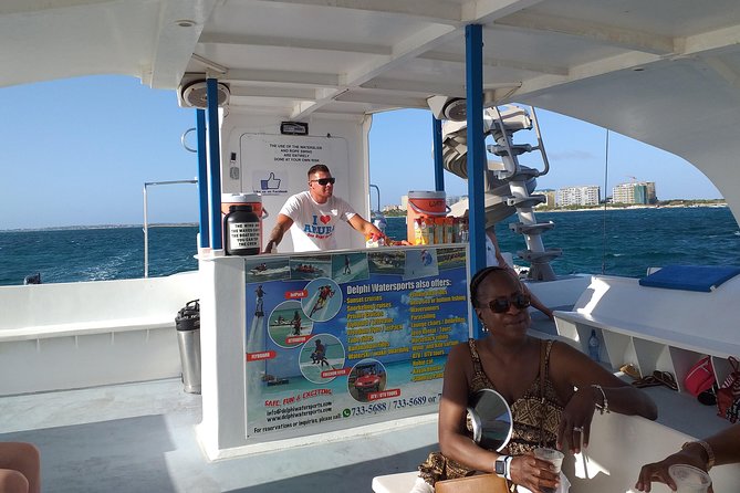 Aruba Sunset Sail Cruise Aboard The Dolphin Catamaran - The Swim Stop, Rope Swing, and Water Slide