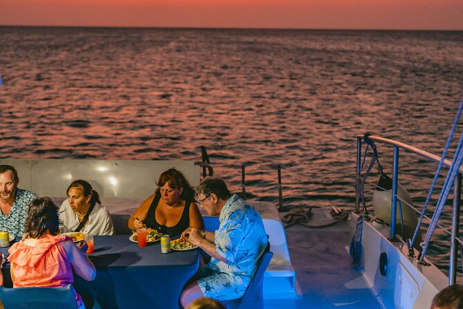 Aruba Sunset Sail Dinner Cruise with Open Bar by Catamaran - Booking, weather, and cancellation details