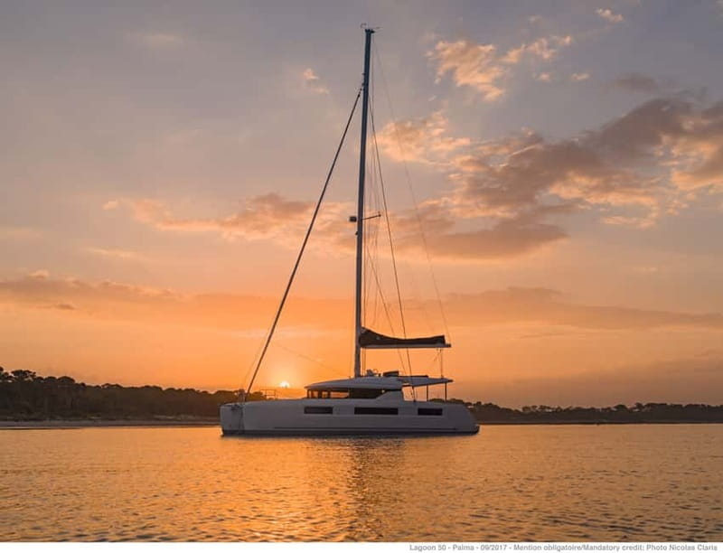 Athens: Half-Day Sunset Catamaran Cruise with Meal & Drinks - Swimming from the stern in clear water