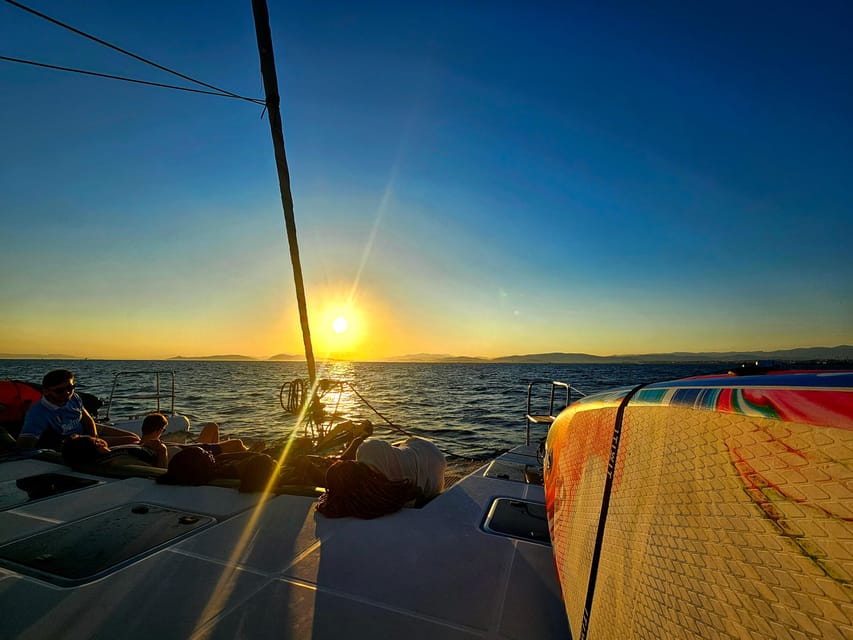 Athens: Riviera Catamaran Tour with Fresh Meal and Drinks - The short cruise to the second stop