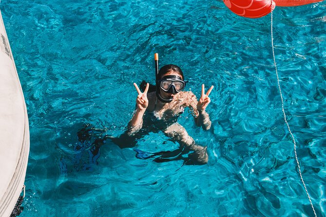 Balos & Gramvousa Luxury Catamaran Sailing Cruise from Kissamos - Swimming, snorkeling, and relaxing onboard