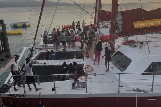 Bamboo Rafting, Catamaran Party Cruise and Snorkeling in Jamaica - A day that changes pace from river calm to boat-party energy