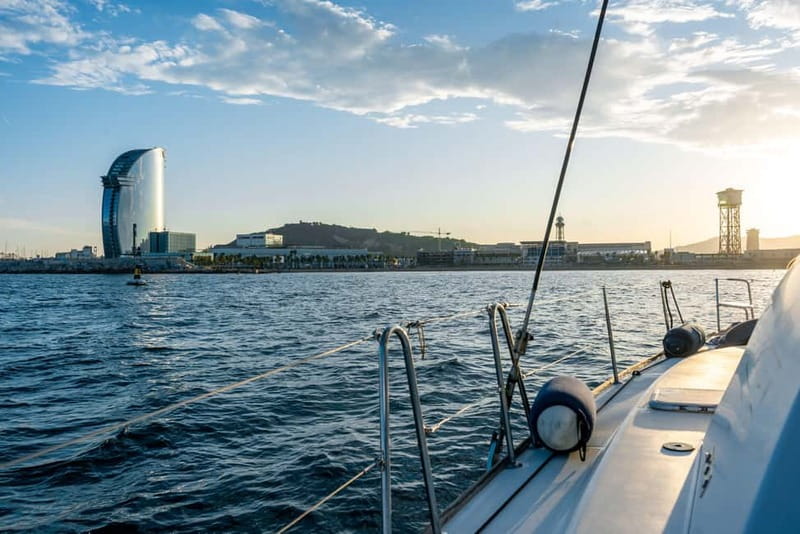 Barcelona: Catamaran Cruise w/ Sailing, Wine, & Tapa - Swimming in the Mediterranean