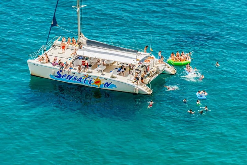 Barcelona: Catamaran Party Cruise with BBQ Meal - Port Olímpic Meeting Point: Read This Before You Go