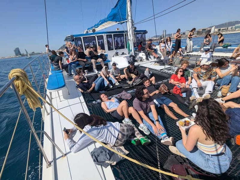 Barcelona: Luxury Catamaran Sunset Cruise - Leaving Port Olimpic as Barcelona opens up