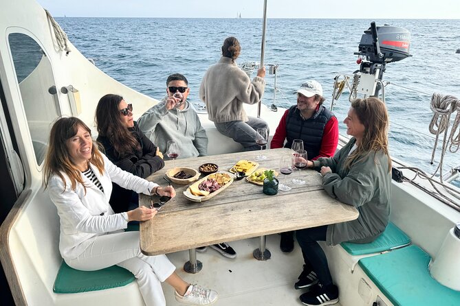 Barcelona Small Group Trip by Catamaran w Tapas, Cava and Sunset - Port Vell with tapas and cava