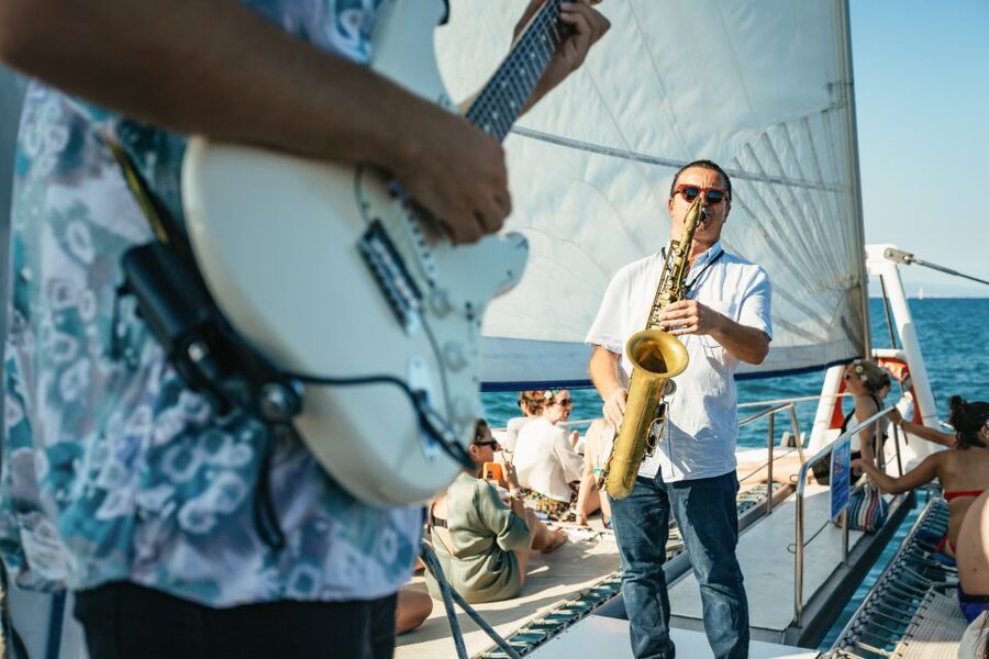 Barcelona: Sunset Catamaran Cruise with Live Music - What you see as Barcelona turns gold