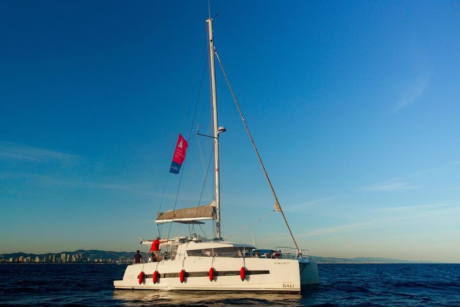 Barcelona: Sunset Catamaran Experience w/ optional Dinner - Barcelona from the sea during the last light