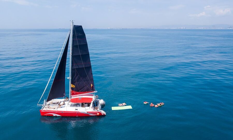 Barcelona: Sunset or Day Catamaran Cruise with Tapa & Drink - Key points at a glance