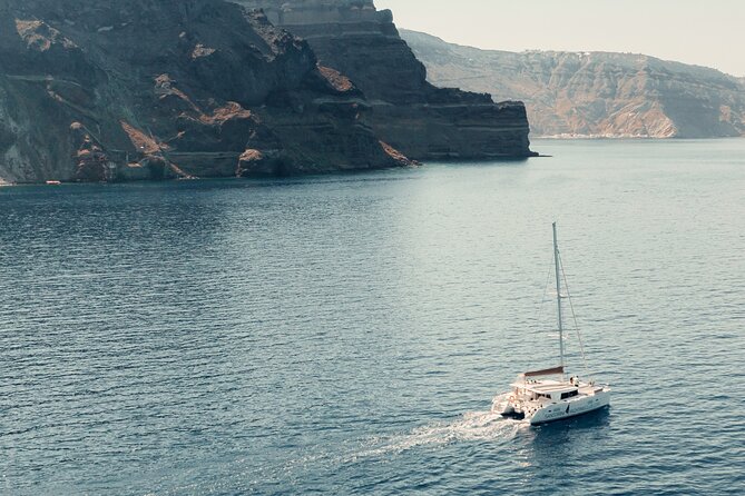 Beautiful Day Catamaran Caldera Cruise incl. Meal & Drinks - Arriving at Vlychada Port