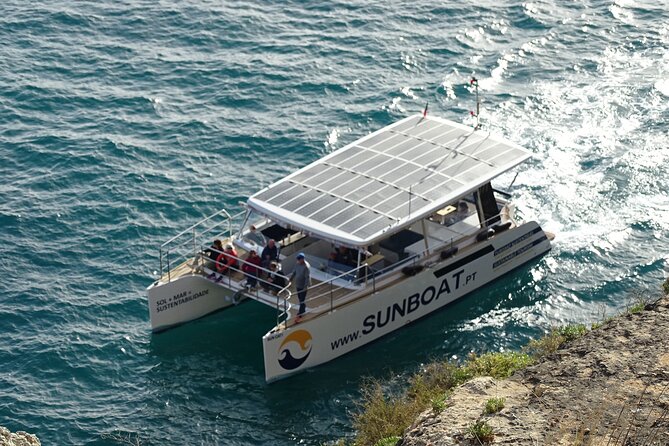 Benagil Caves & Coast from Portimão on an Eco-Friendly Catamaran - Alfanzina Lighthouse and its large cave