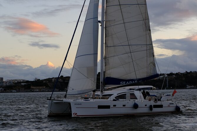 Boat Rental on a Luxurious Catamaran in Lisbon - Under the 25 de Abril Bridge