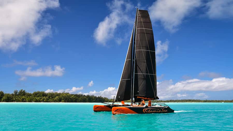 Bora Bora: Sunset Catamaran Cruise with Snacks and Drinks - Setting sail from your hotel dock