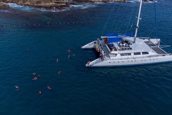 Cabo San Lucas Catamaran Cruise: Snorkel or Sunset Adventure - The open bar, music, and onboard comfort