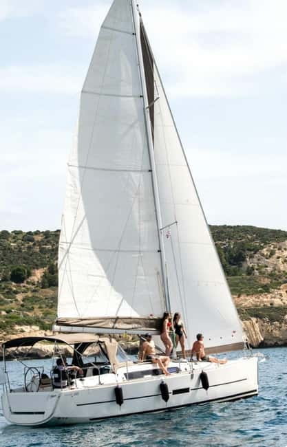 Cagliari: Catamaran Tour, Swimming, Snorkeling, & Prosecco - Cala Bernat and the first coastal views