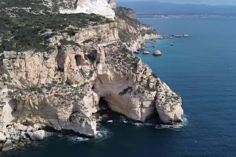 Cagliari: Catamaran Tour, Swimming, Snorkeling, & Prosecco - The return ride and prosecco toast