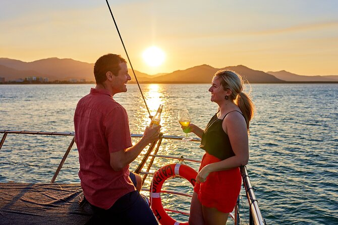 Cairns Catamaran Harbour and Dinner Cruise - A welcome drink before the Cairns skyline appears