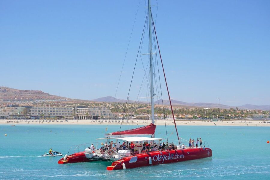 Caleta de Fuste: Catamaran Sailing Experience - Leaving Caleta de Fuste on the Obycat