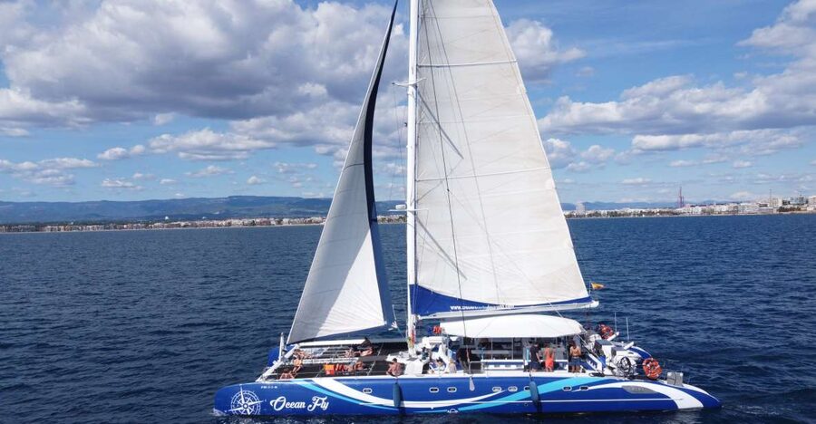 Cambrils: Costa Dorada Catamaran Day Cruise with BBQ Lunch - Watching the Costa Dorada coastline from the water