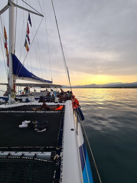 Cambrils: Costa Dorada Sunset Catamaran Cruise with Drinks - Drinks, music, and the real value of $38