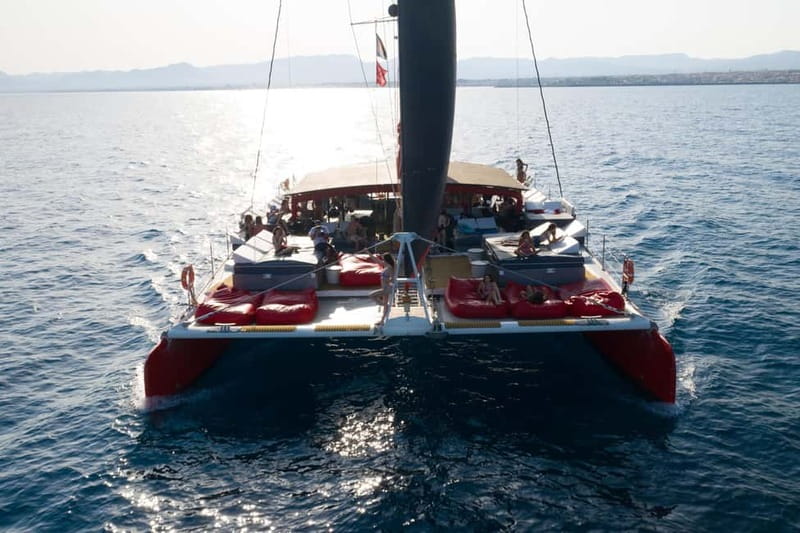Cambrils/Salou: Coastline Catamaran 2h with drinks, pickup - A swim stop near Platja de les Palmeres