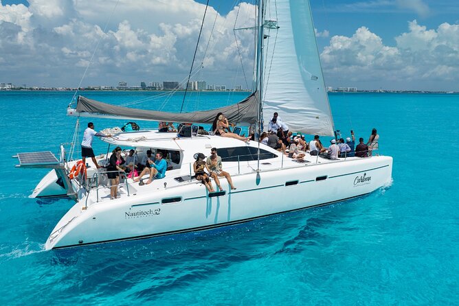 Cancun Catamaran: Isla Mujeres, Snorkeling, Drinks & Buffet Lunch - Snorkeling From the Boat