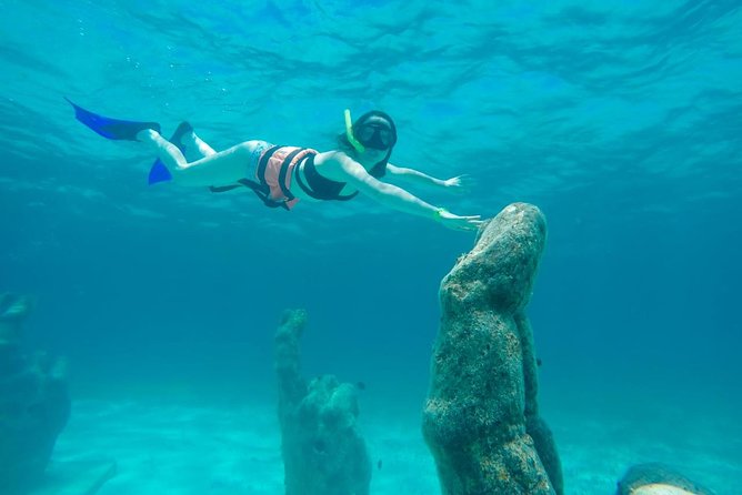 Cancun Half-Day Sailing Catamaran Cruise to Isla Mujeres - Setting sail from Playa Langosta at noon