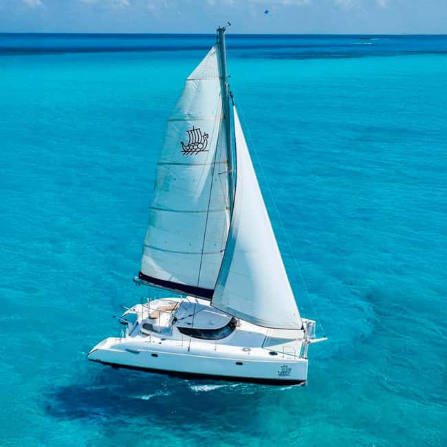 Cancun: Premium Catamaran with Transportation & Dock fee - Boarding the catamaran in Cancun