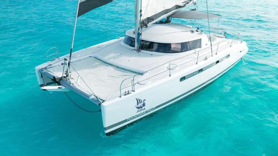 Cancun: Premium Catamaran with Transportation & Dock fee - Two hours to make your own plan on Isla Mujeres