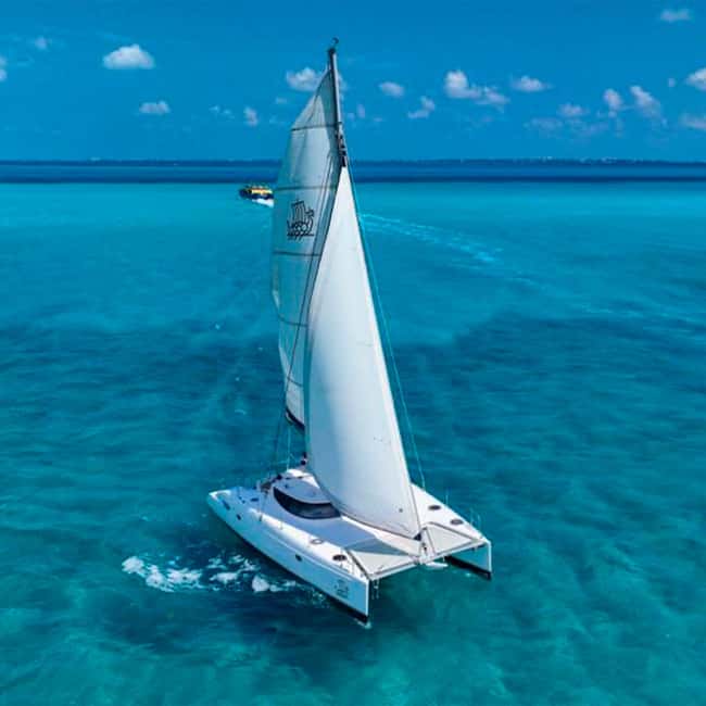 Cancun: Premium Catamaran with Transportation & Dock fee - Hotel pickup sets the day’s rhythm