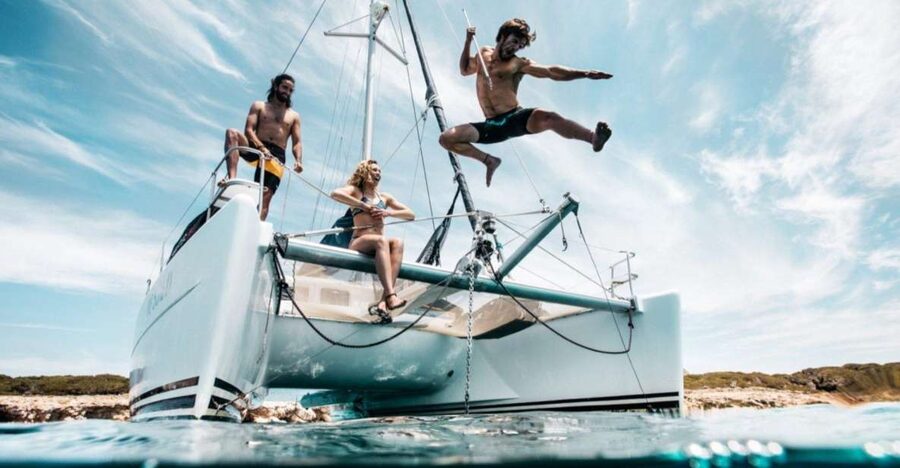 Cannigione: Catamaran daily tour to La Maddalena Archipelago - A Sardinian lunch served at sea