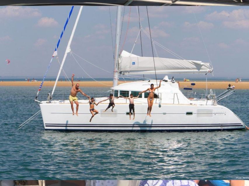 Cannigione: Catamaran daily tour to La Maddalena Archipelago - Timing, cancellation, and what to pack