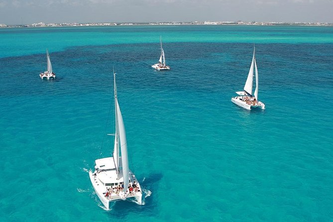 Catamaran adventure to Isla Mujeres with Snorkel,Buffet,Open Bar and Beach Club - Snorkeling is a short group activity