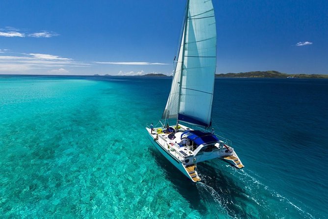 Catamaran adventure to Isla Mujeres with Snorkel,Buffet,Open Bar and Beach Club - The return sail keeps the party going