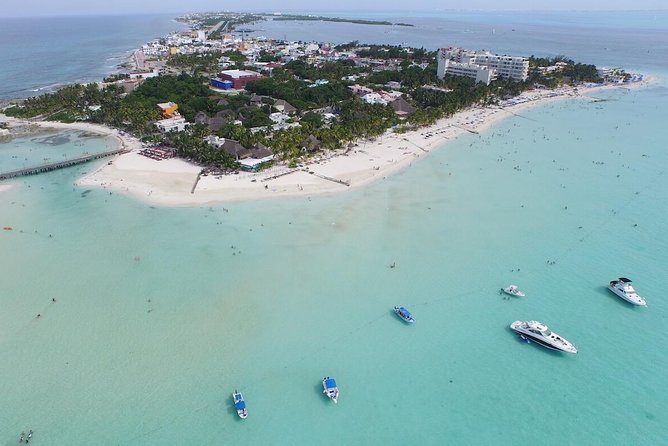 Catamaran adventure to Isla Mujeres with Snorkel,Buffet,Open Bar and Beach Club - Playa Norte brings the island reward